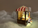 Weihnachtsdorf/-szene:  Popcornautomat mit LED Beleuchtung, bewegenden Popcorns, batteriebetrieben