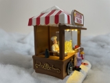 Weihnachtsdorf/-szene:  Popcornautomat mit LED Beleuchtung, bewegenden Popcorns, batteriebetrieben