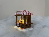 Weihnachtsdorf/-szene:  Popcornautomat mit LED Beleuchtung, bewegenden Popcorns, batteriebetrieben