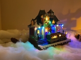 Christmas village/scene: train with LED lighting, music and moving train, including mains adapter; available from 15.10.2022